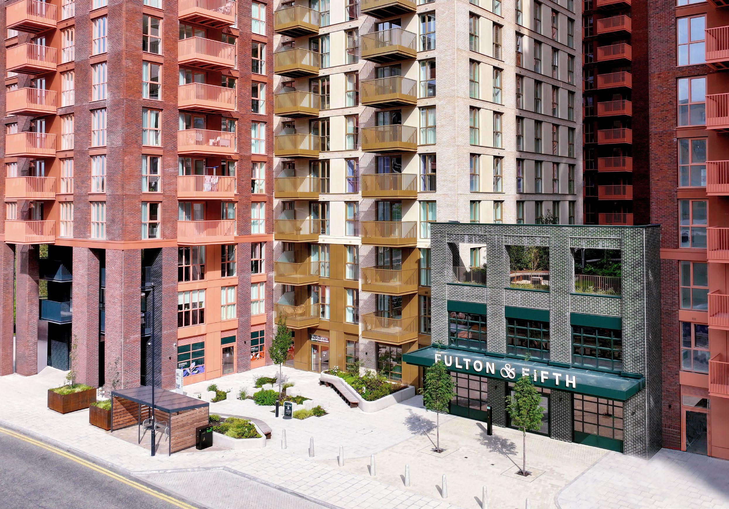 Aerial view of Fulton and Fifth new build apartments Wembley with stadium
