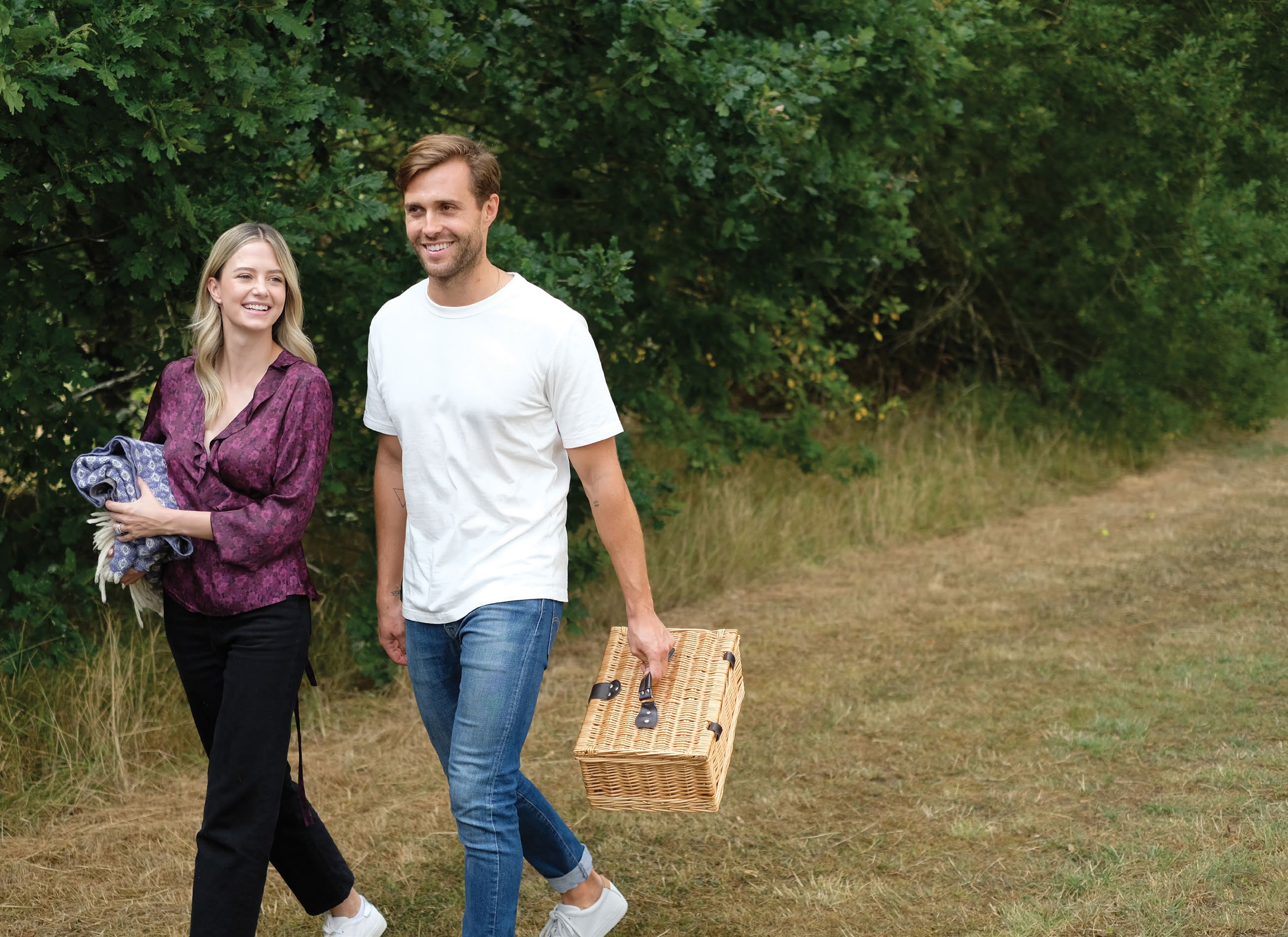Couple enjoying green spaces near Fulton Fifth Wembley Park apartments